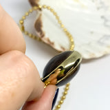 Cadena militar con baño de oro 18K y pepa de zamuro engastada